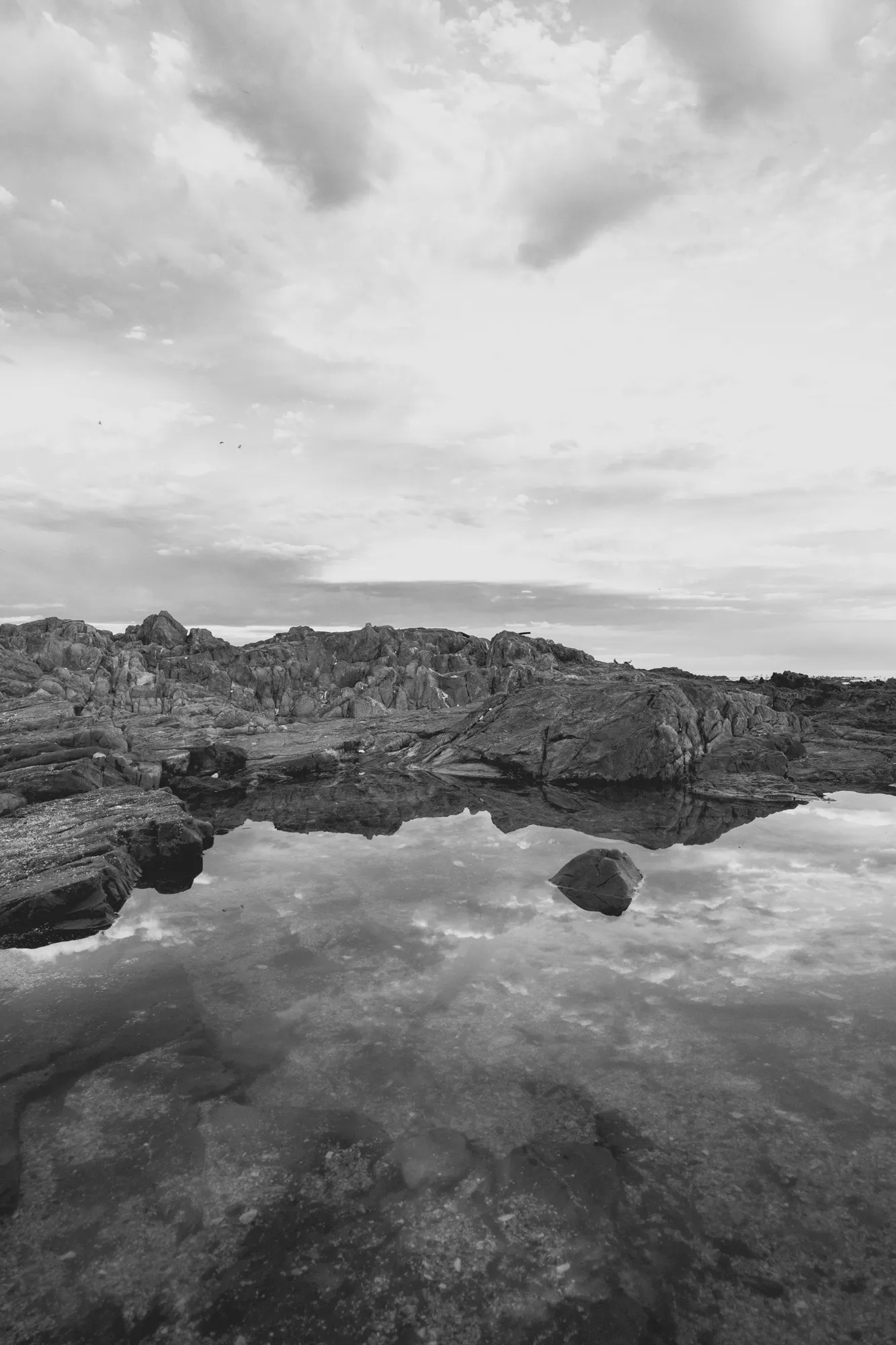 2022-02-13 - Cape Town - The sky reflecting on a small pond next to the ocean